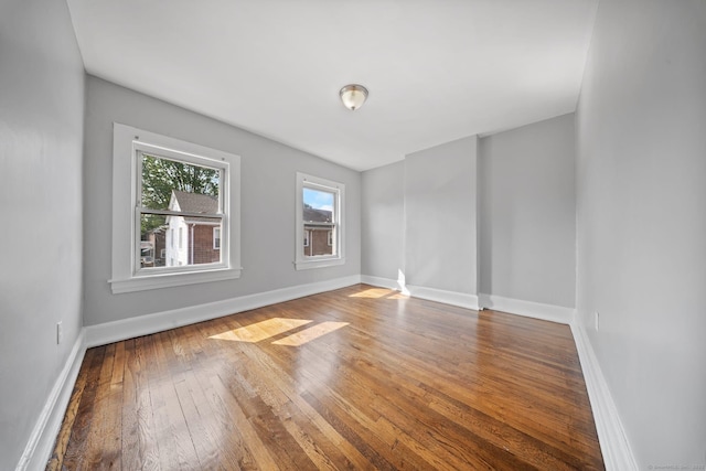 110 Asylum St, Bridgeport, CT 06610 - unfurnished room with hardwood / wood-style floors and baseboards