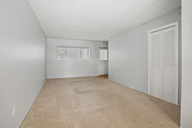 4 Union Ave Apt 30, Norwalk, CT 06851 - unfurnished bedroom with carpet, a textured ceiling, and a closet
