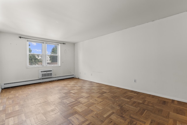 140 Grove St Unit 4F, Stamford, CT 06901 - spare room with a baseboard heating unit and an AC wall unit