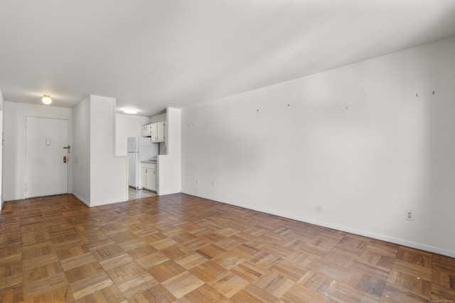 140 Grove St Unit 4F, Stamford, CT 06901 - unfurnished living room with baseboards