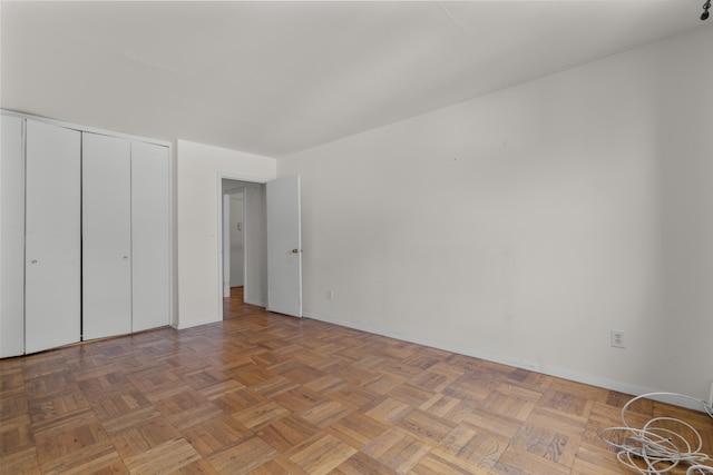 140 Grove St Unit 4F, Stamford, CT 06901 - unfurnished bedroom featuring baseboards and a closet