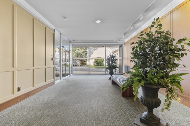 140 Grove St Unit 4F, Stamford, CT 06901 - lobby with a decorative wall and expansive windows