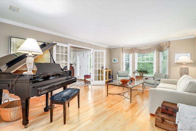 9 Maplewood Dr, Danbury, CT 06811 - living area featuring crown molding, wood finished floors, and french doors