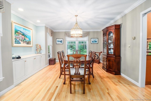 9 Maplewood Dr, Danbury, CT 06811 - dining room with a chandelier, light wood finished floors, crown molding, and recessed lighting