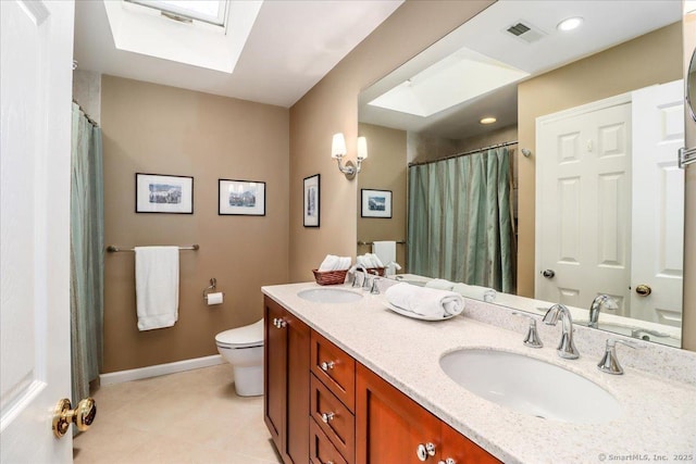 9 Maplewood Dr, Danbury, CT 06811 - bathroom featuring a skylight, double vanity, tile patterned flooring, and a shower with curtain