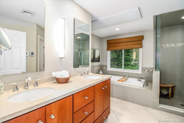 9 Maplewood Dr, Danbury, CT 06811 - full bath featuring double vanity, a bath, tile patterned flooring, and a tile shower
