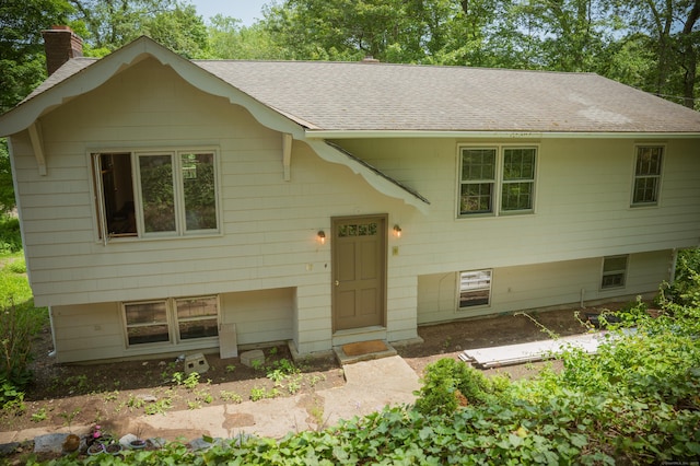 17 Valley Rd, Clinton, CT 06413 - bi-level home featuring a chimney and a shingled roof