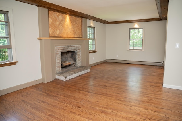 17 Valley Rd, Clinton, CT 06413 - unfurnished living room with a baseboard radiator, light wood finished floors, and a fireplace