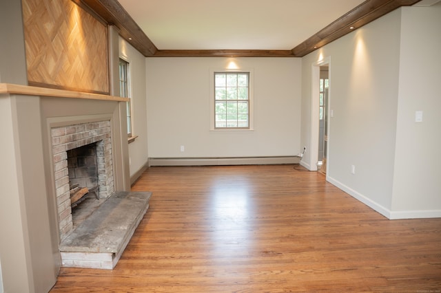 17 Valley Rd, Clinton, CT 06413 - unfurnished living room with a baseboard radiator, a brick fireplace, and light wood-style flooring