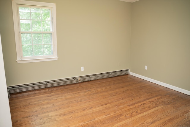 17 Valley Rd, Clinton, CT 06413 - unfurnished room featuring a baseboard heating unit and wood finished floors