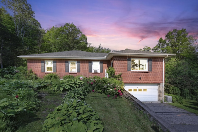 98 Aetna Ave, Torrington, CT 06790 - ranch-style home featuring driveway, a garage, brick siding, and a shingled roof