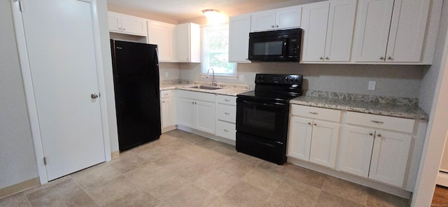 159 Windsorville Rd, South Windsor, CT 06074 - kitchen with black appliances and white cabinetry