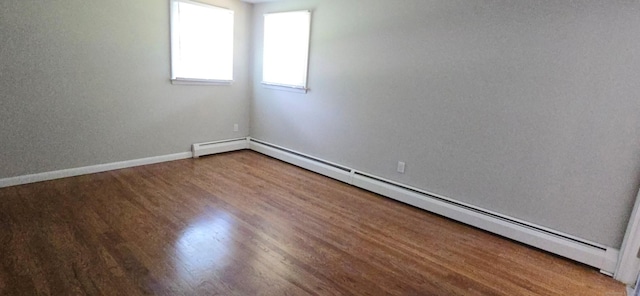 159 Windsorville Rd, South Windsor, CT 06074 - unfurnished room featuring a baseboard radiator and wood finished floors