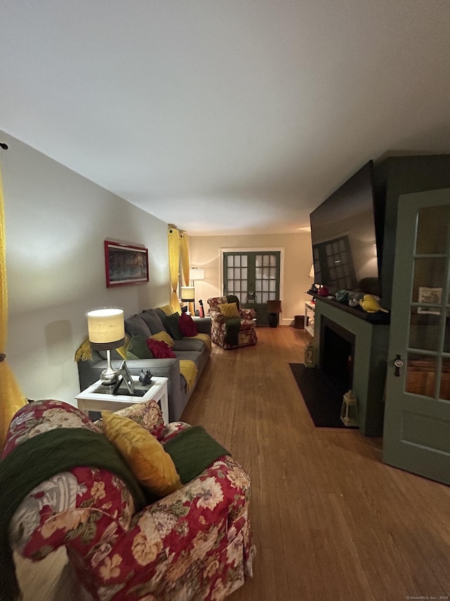 5 Sunnyslope Dr, Middletown, CT 06457 - living area with wood finished floors and a fireplace with flush hearth