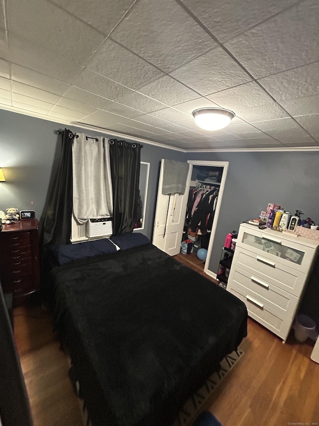 5 Sunnyslope Dr, Middletown, CT 06457 - bedroom featuring wood finished floors, a closet, a paneled ceiling, and cooling unit