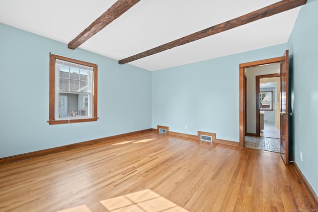 32 Franklin St, Southington, CT 06479 - bonus room featuring healthy amount of natural light, wood finished floors, and beam ceiling