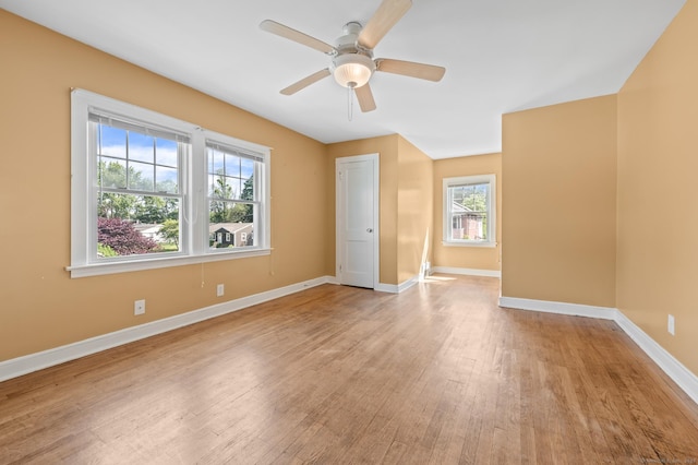 32 Franklin St, Southington, CT 06479 - unfurnished room featuring plenty of natural light, light wood-style flooring, and a ceiling fan