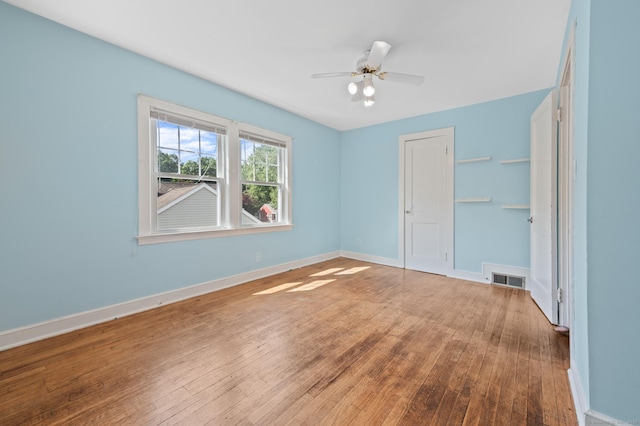 32 Franklin St, Southington, CT 06479 - unfurnished bedroom featuring hardwood / wood-style flooring, a closet, and ceiling fan