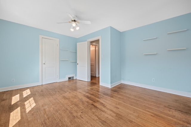 32 Franklin St, Southington, CT 06479 - unfurnished bedroom featuring wood finished floors, a closet, and a ceiling fan