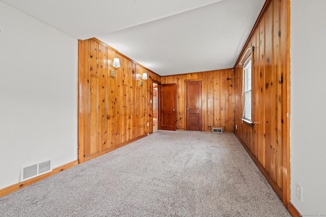32 Franklin St, Southington, CT 06479 - carpeted spare room with wood walls