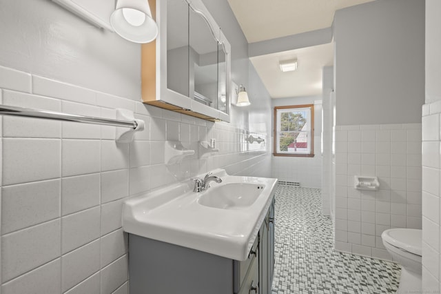 32 Franklin St, Southington, CT 06479 - bathroom with tile walls, vanity, wainscoting, and tiled shower