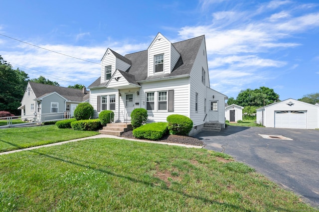 32 Franklin St, Southington, CT 06479 - cape cod house featuring a detached garage, driveway, a storage shed, and a shingled roof