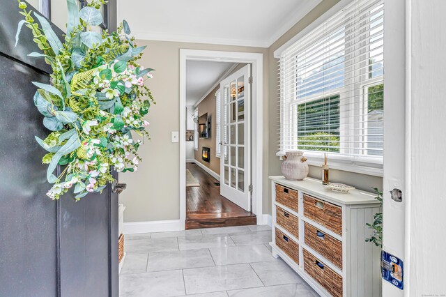 131 Long Hill Cross Rd, Shelton, CT 06484 - entryway with light marble finish flooring, crown molding, and french doors