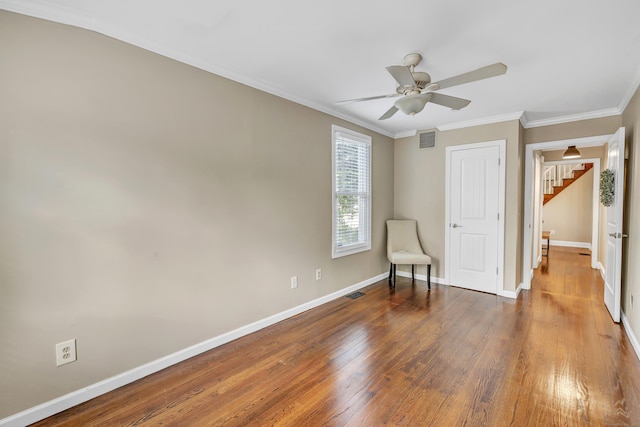 131 Long Hill Cross Rd, Shelton, CT 06484 - unfurnished room featuring ornamental molding, a ceiling fan, and wood finished floors