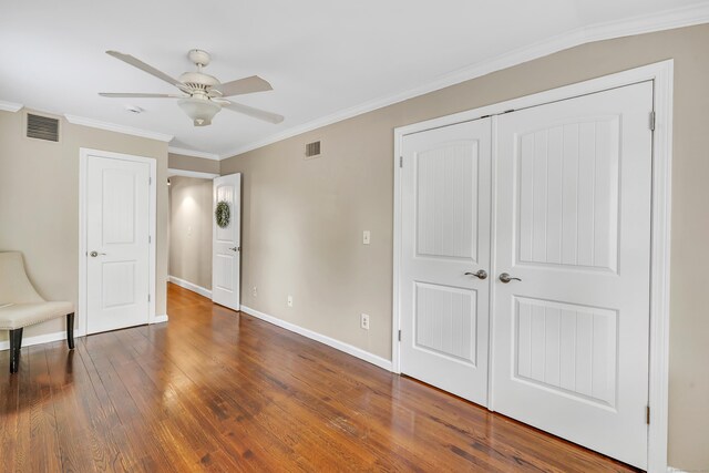 131 Long Hill Cross Rd, Shelton, CT 06484 - unfurnished room with crown molding, wood finished floors, and a ceiling fan