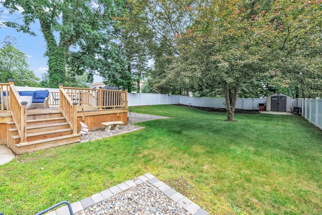 131 Long Hill Cross Rd, Shelton, CT 06484 - fenced backyard featuring a storage unit and a deck