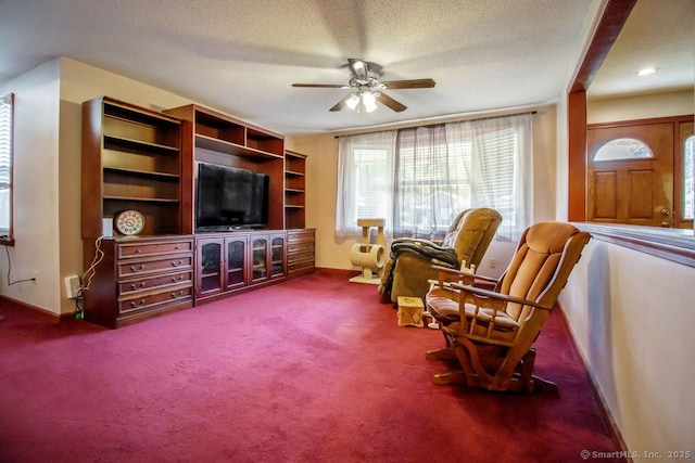 23 Church St, Plainville, CT 06062 - sitting room with ceiling fan, carpet, and a textured ceiling