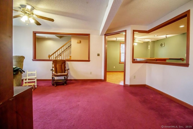23 Church St, Plainville, CT 06062 - sitting room with carpet flooring, stairway, ceiling fan, and a textured ceiling