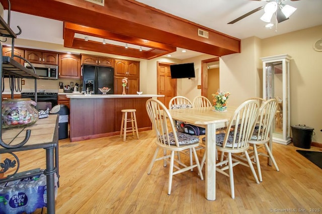 23 Church St, Plainville, CT 06062 - dining room featuring ceiling fan and light wood-style flooring