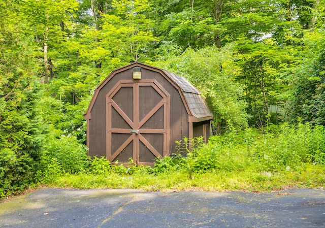 166 S Main St, Marlborough, CT 06447 - view of shed with a wooded view