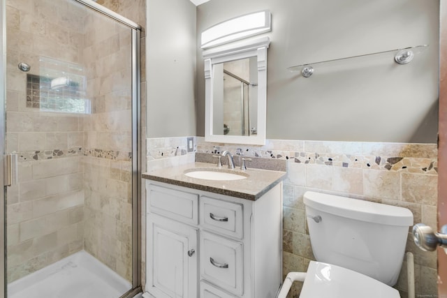 166 S Main St, Marlborough, CT 06447 - full bath with a stall shower, vanity, wainscoting, and tile walls