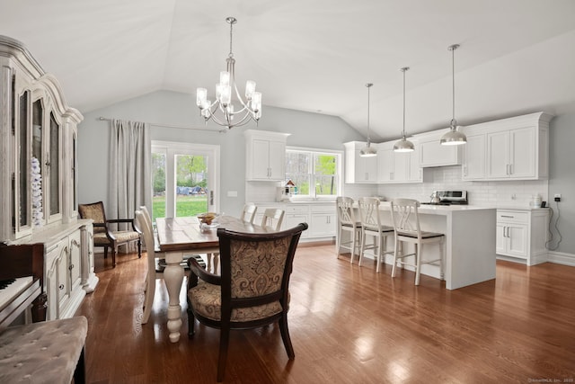 24 Appletree Ln, Norwalk, CT 06850 - dining space with lofted ceiling, a chandelier, and dark wood finished floors
