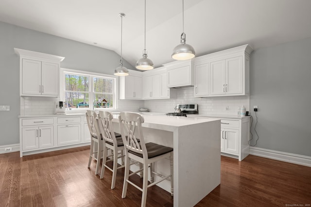 24 Appletree Ln, Norwalk, CT 06850 - kitchen featuring vaulted ceiling, light countertops, and white cabinets