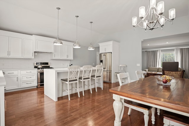 24 Appletree Ln, Norwalk, CT 06850 - dining space with a chandelier, lofted ceiling, and dark wood finished floors