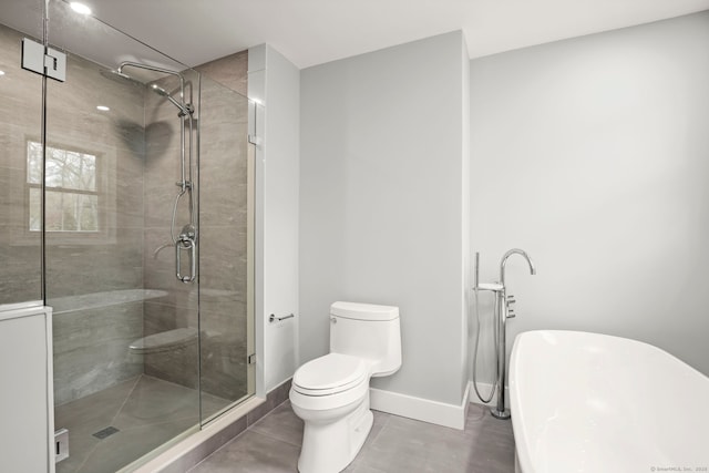 24 Appletree Ln, Norwalk, CT 06850 - full bathroom featuring a freestanding tub, a shower stall, and tile patterned flooring