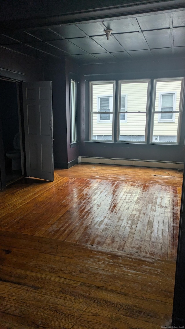44 Convent Ave, Norwich, CT 06360 - spare room with hardwood / wood-style flooring and baseboard heating