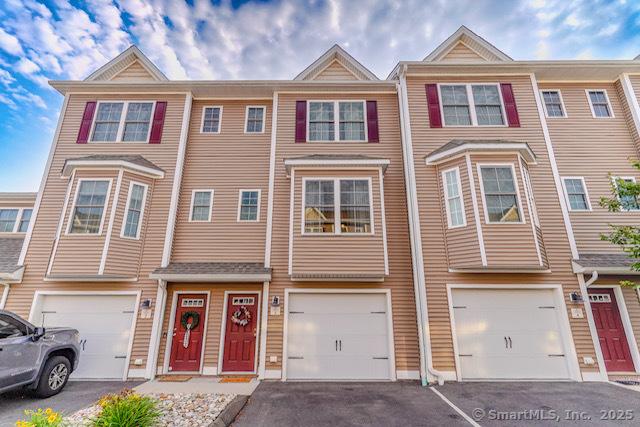 41 Eden Ave Unit 3, Southington, CT 06489 - townhome / multi-family property with driveway and a garage