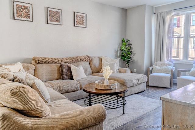 41 Eden Ave Unit 3, Southington, CT 06489 - living room with wood finished floors and healthy amount of natural light