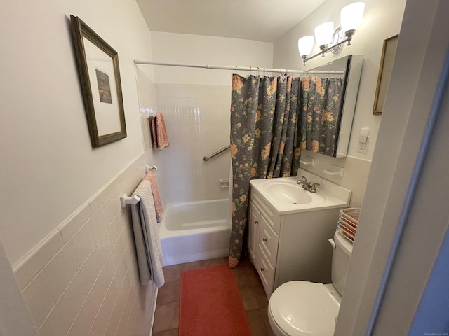 2625 Park Ave Unit 11P, Bridgeport, CT 06604 - full bathroom with vanity, shower / bath combo, wainscoting, tile walls, and tile patterned floors
