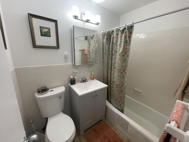 2625 Park Ave Unit 11P, Bridgeport, CT 06604 - bathroom featuring shower / bath combo, vanity, tile walls, and tile patterned floors