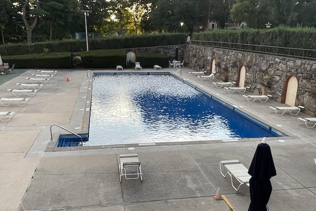 2625 Park Ave Unit 11P, Bridgeport, CT 06604 - community pool featuring a patio and view of wooded area