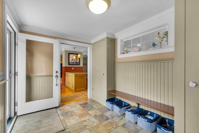 128 Holcomb Hill Rd, New Hartford, CT 06057 - mudroom featuring a wainscoted wall, ornamental molding, and light stone finish flooring