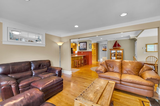 128 Holcomb Hill Rd, New Hartford, CT 06057 - living area featuring light wood-style flooring, ornamental molding, and recessed lighting
