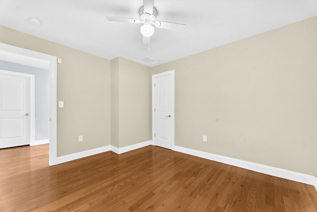 24 Main St, East Hampton, CT 06424 - spare room featuring wood finished floors, a ceiling fan, and a smoke detector