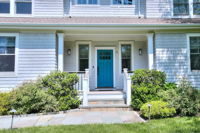 16 Gault Park Dr, Westport, CT 06880 - entrance to property featuring roof with shingles and covered porch