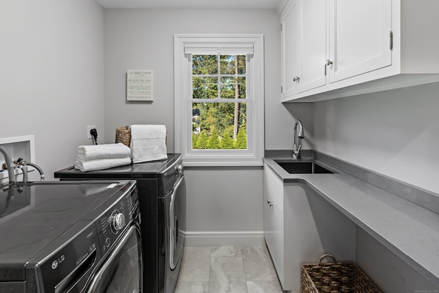 16 Gault Park Dr, Westport, CT 06880 - laundry area featuring cabinet space, light marble finish floors, and washing machine and clothes dryer
